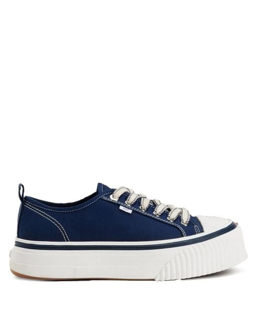 Baskets ami 1980 bleu marine AMI en coloris Blue