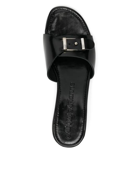 About Arianne Black Nua Sandals