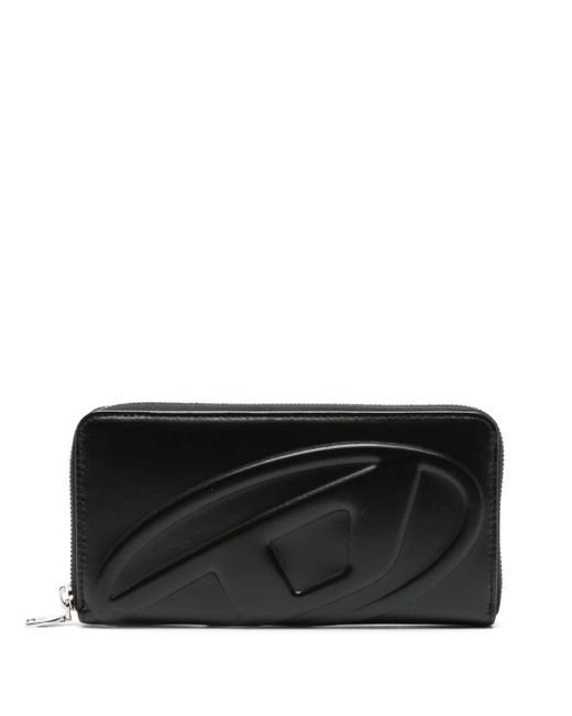 Long portefeuille zippé avec logo embossé DIESEL en coloris Black
