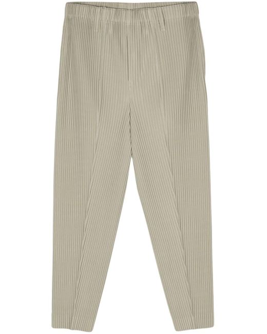 Homme Plissé Issey Miyake Natural Compleat Tapered-leg Trousers for men