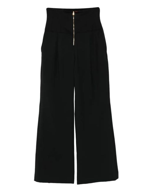 Pantalones ajustados con cremallera Thelatest de color Black