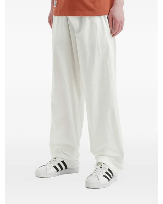 Chocoolate White Logo-Patch Trousers for men