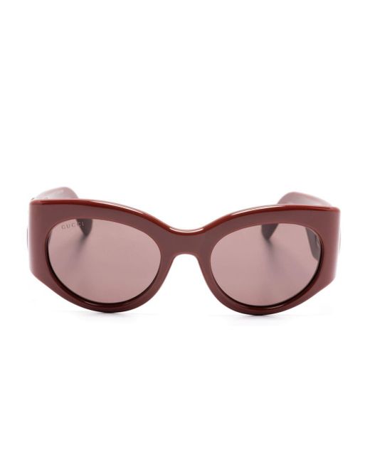Gucci Pink Sonnenbrille mit ovalem Gestell