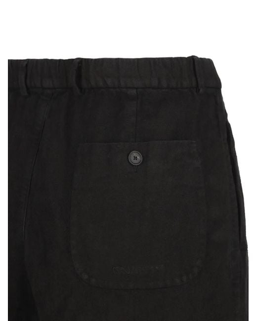 Massimo Osti Studio Black Pleated Logo-Patch Trousers for men