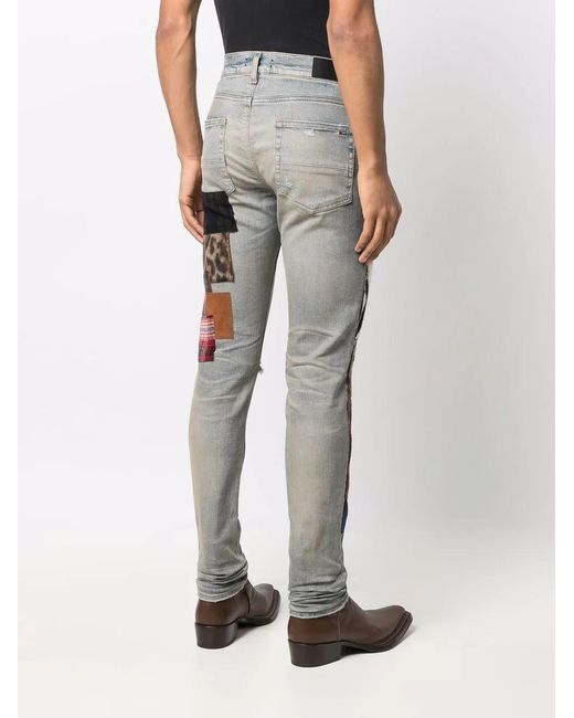 Vaqueros Con Diseño De Patchwork Amiri de hombre de color Blue