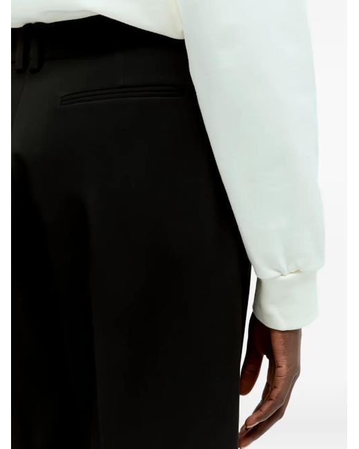 The Row Black Flared Crop Trousers