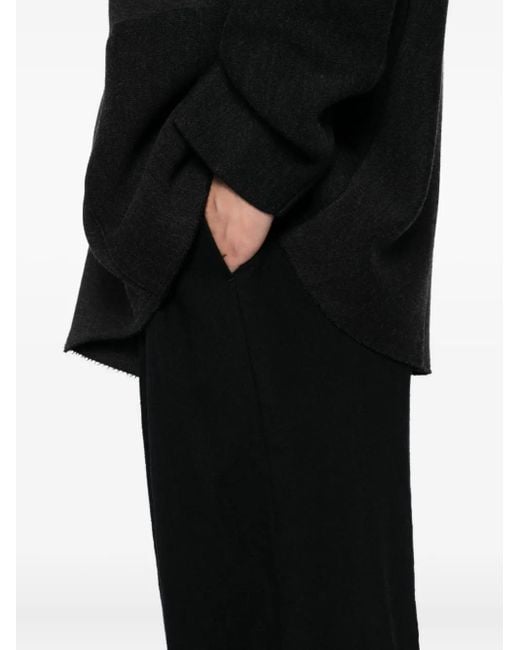 DEVOA Black Pleated-Panel Trousers for men