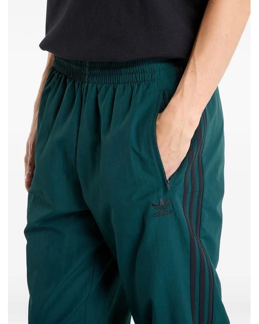 Adidas Green Firebird Woven Track Pants for men
