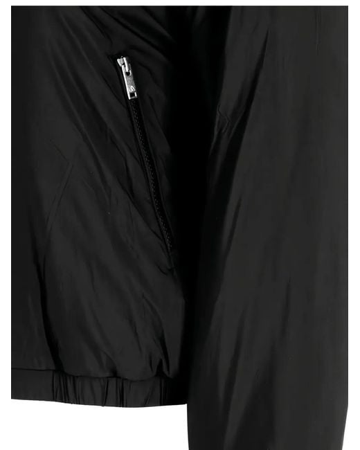 Moose Knuckles Black Cropped Faux Fur Jacket With Plush Hood And Zippered Pockets