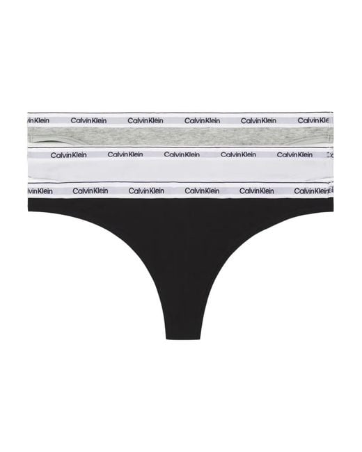 Pack de tres tangas con logo en la cinturilla Calvin Klein de color Black