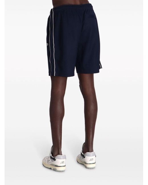 Pantalones cortos de deporte con detalle de rayas Lacoste de hombre de color Blue