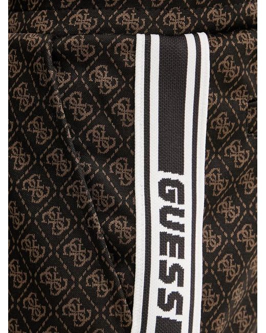 Guess Black Monogram-Print Side-Stripe Track Pants for men