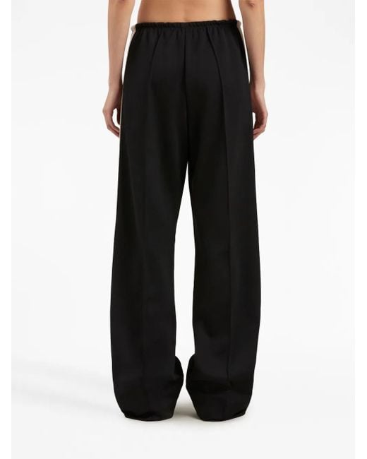 Pantalones de chándal con detalle de rayas Palm Angels de color Black