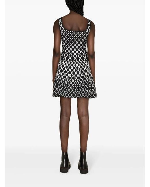 Robe Courte Évasée À Motif En Jacquard Maje en coloris Black