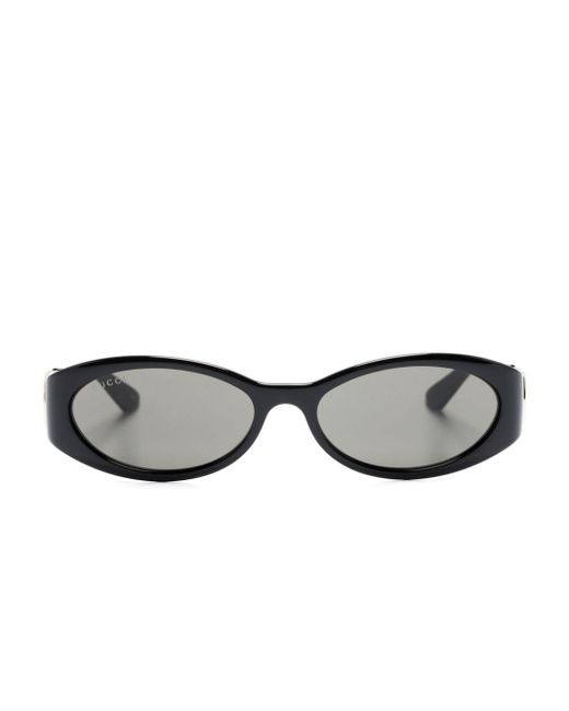 Gafas de sol con montura oval Gucci de color Black