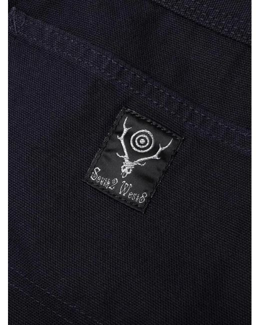 South2 West8 Blue Logo-Patch Trousers for men