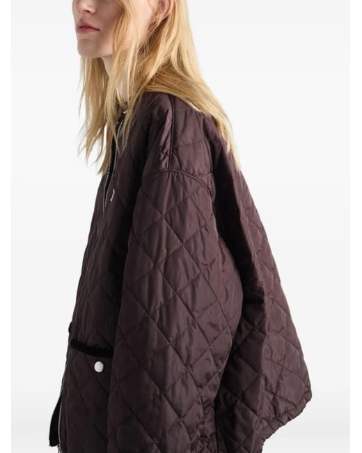 Plumífero con logo triangular Prada de color Brown