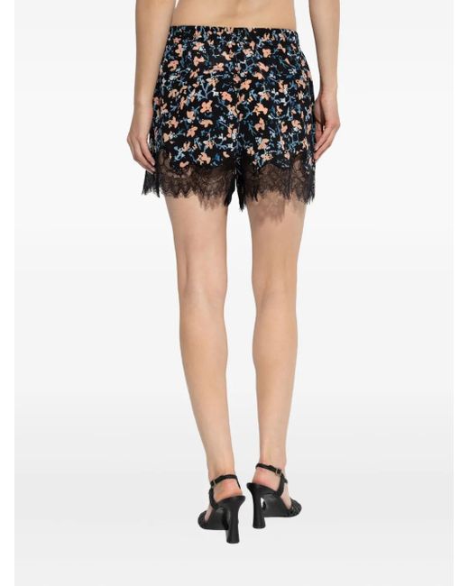 Pantalones cortos Noella con estampado floral y ribete de encaje Ulla Johnson de color Blue