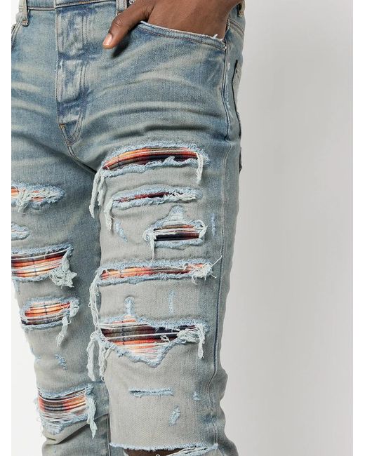 Amiri Blue Distressed Skinny Jeans for men