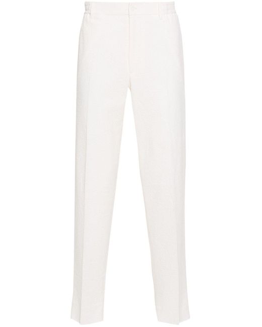 Seersucker tapered trousers di Tagliatore in White da Uomo