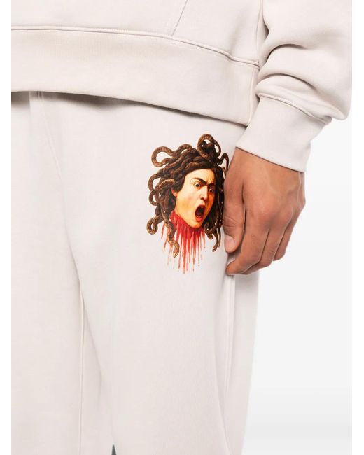 Melt White Graphic-Print Track Pants for men