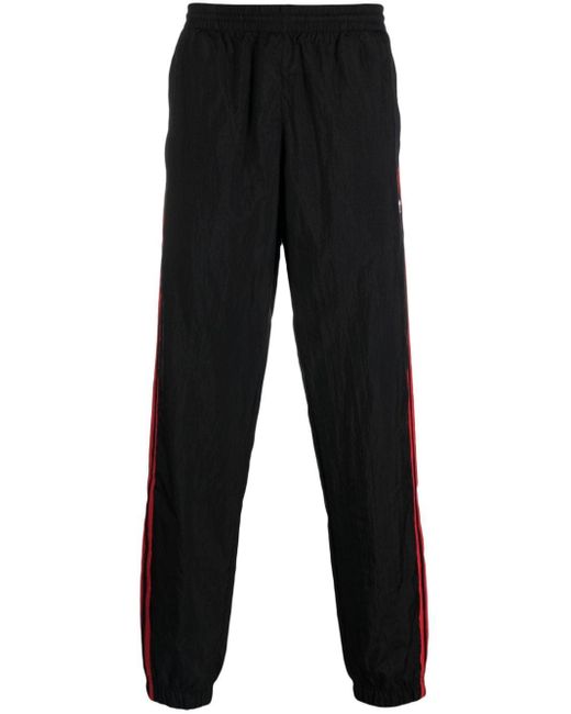 Pantalon de jogging à rayures Adidas pour homme en coloris Black