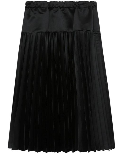 Jupe mi-longue à design plissé Comme des Garçons en coloris Black