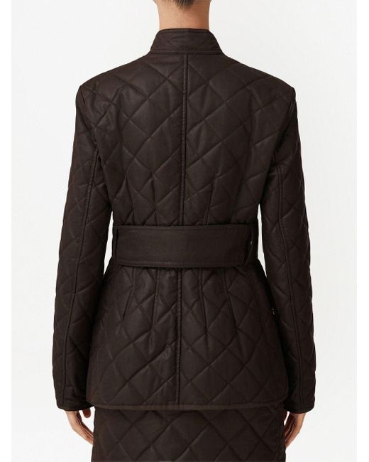 Belted quilted jacket Burberry de color Black