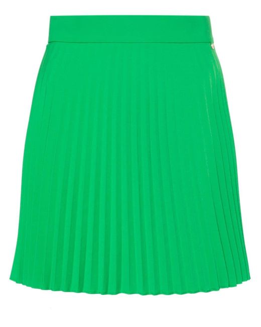 Minigonna a vita alta plissettata di Nissa in Green