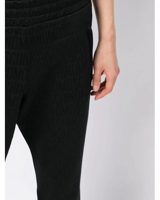 Moschino Black Logo-Print Trousers for men
