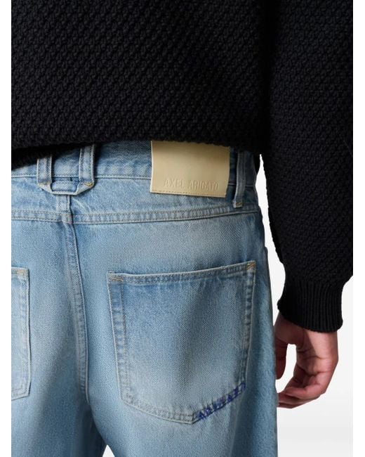 Axel Arigato Blue Zine Coated Dip-Dye Jeans for men