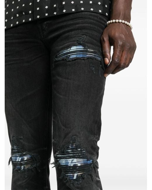 Jeans skinny con effetto vissuto MX1 di Amiri in Black da Uomo