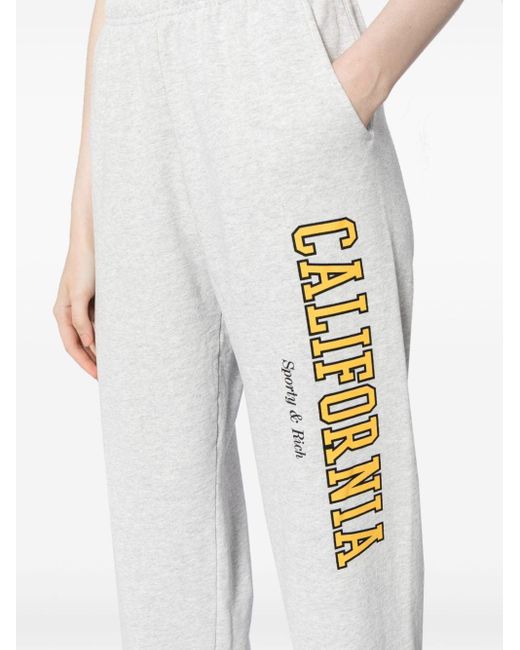 Pantalones de chándal California con logo estampado Sporty & Rich de color White