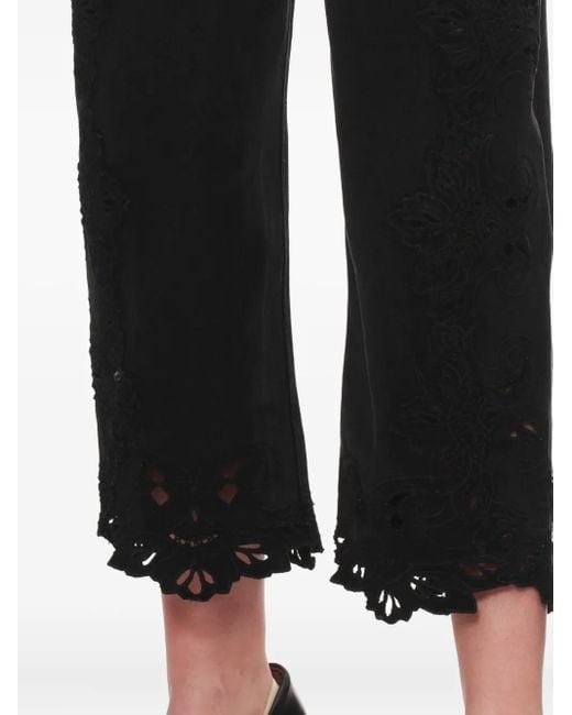 Vaqueros con encaje floral Sea de color Black