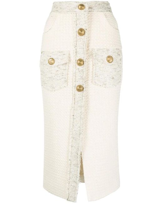 Falda de tubo con botones Balmain de color Natural