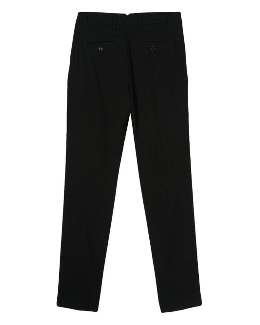 Pantalones ajustados AMI de color Black
