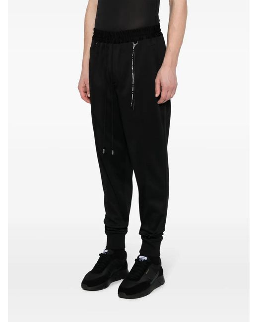 MASTERMIND WORLD Black Logo-Print Drawstring Track Pants for men