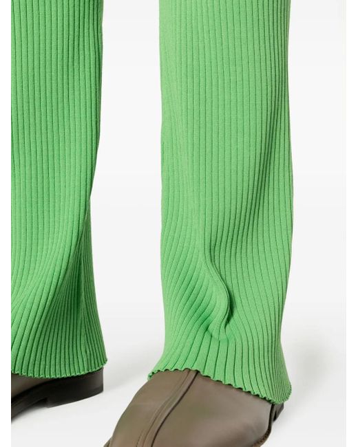 Pantalones de canalé Cornelie acampanados Nanushka de color Green