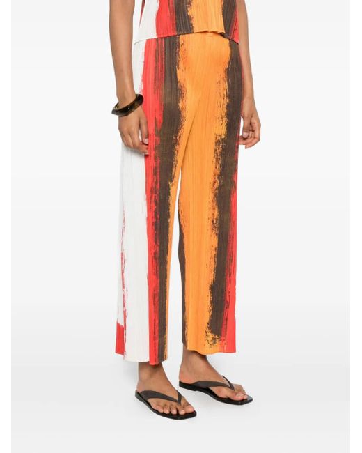 Pleats Please Issey Miyake Orange Pleated Stripe Trousers