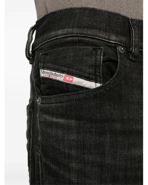 Jeans affusolati con applicazione di DIESEL in Black da Uomo