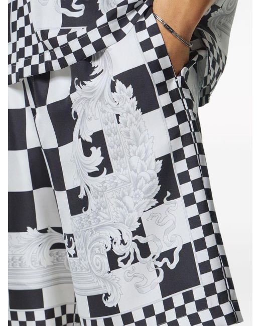 | Bermuda stampa scacchi | male | NERO | 48 di Versace in Black da Uomo