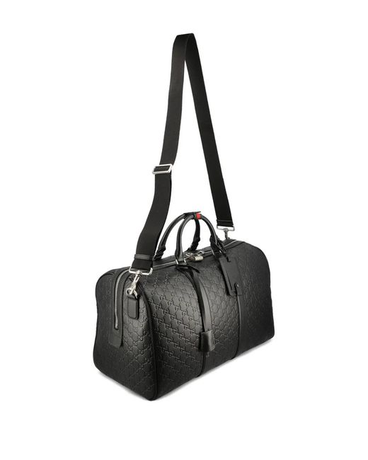Gucci Black Medium Gg Emblem Embossed Holdall for men