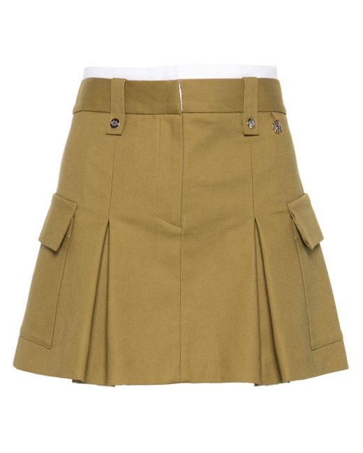 Jinima low-waisted cargo miniskirt Maje en coloris Natural