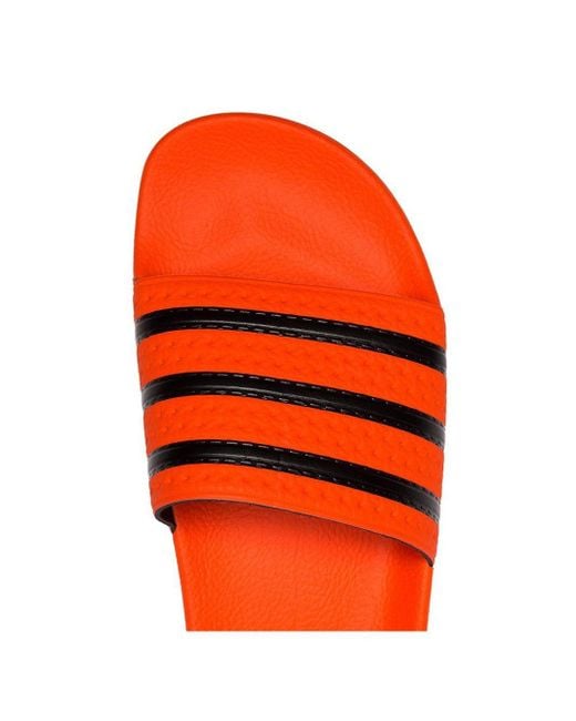 adidas Oranje Adilette Slippers Van Rubber voor heren | Lyst NL