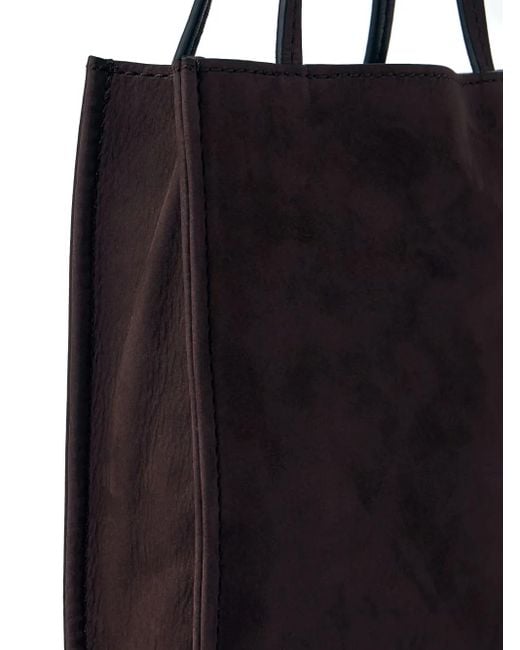 Petit Sac À Main To Go En Daim The Row en coloris Black