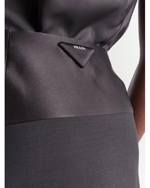 Minifalda A Paneles Con Logo Triangular Prada de color Black