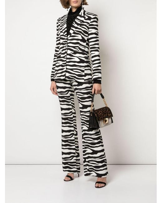 Rachel Zoe Synthetic Zebra-print Flared Trousers in White | Lyst