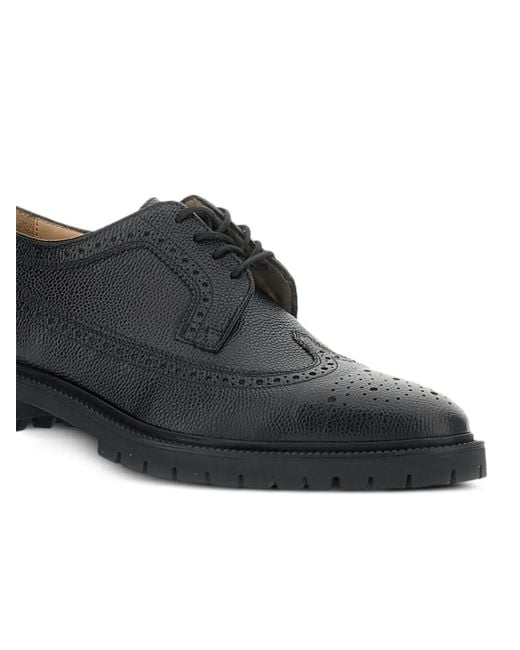 Thom Browne Black Longwing Brogue Pebbled Leather Lace-Up Shoes for men