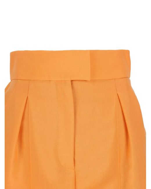 Valentino Garavani Orange Pantalon Droit À Design Plissé
