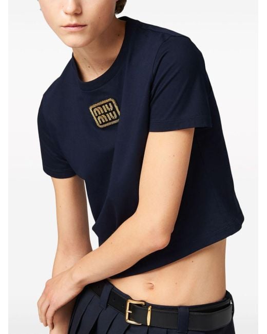 Camiseta corta con aplique del logo Miu Miu de color Blue
